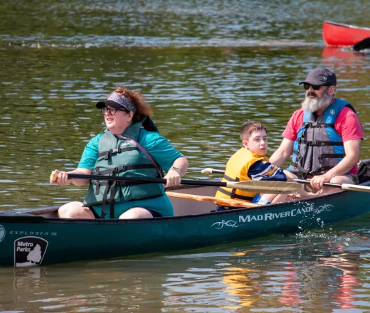 A family on the lake at the Outdoor Inclusive Adventure