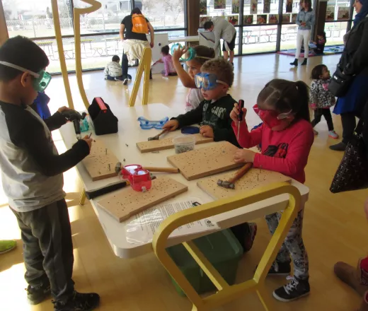 image of kids in head start program working with tools on a project