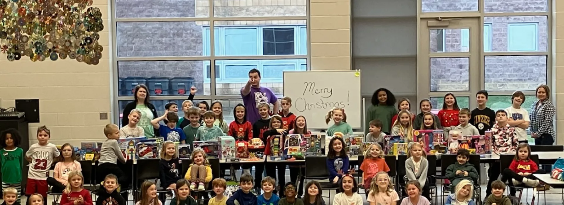 Group of students at Y-Club with staff